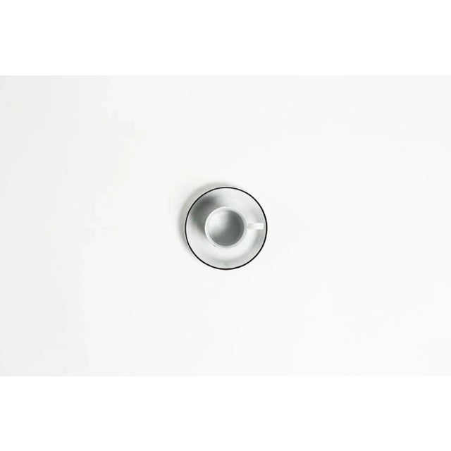 Description: Porcelain coffee cups & saucers, set of 4 Collection: Africa Nera