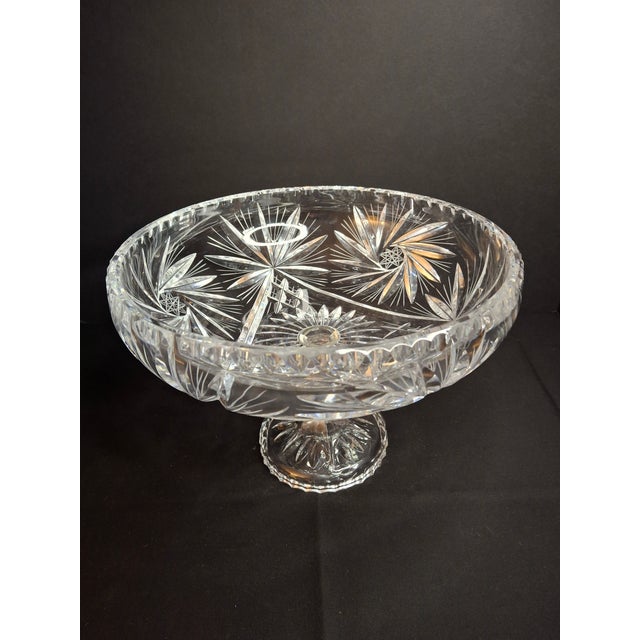 An impressive, high-clarity American Brilliant Period (ABP) cut lead crystal pedestal centerpiece compote. This monumental...