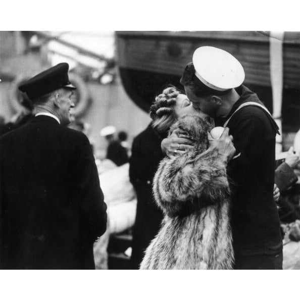 Passionate Farewell 11th December 1945: A sailor bids a passionate farewell to his sweetheart, before setting sail. (Photo...