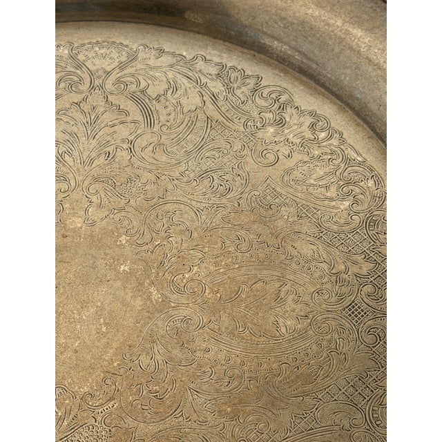 I love it because we search for found objects to repurpose them into beautiful furniture. This table has a handmade base...
