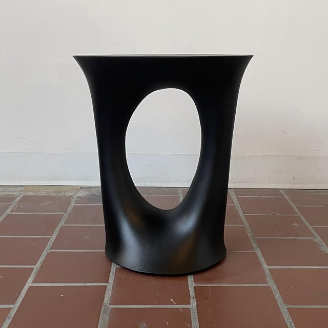 This is a floor model of Souda's short black Kreten Side Table. The finish isn't quite as pristine as we'd like and there...