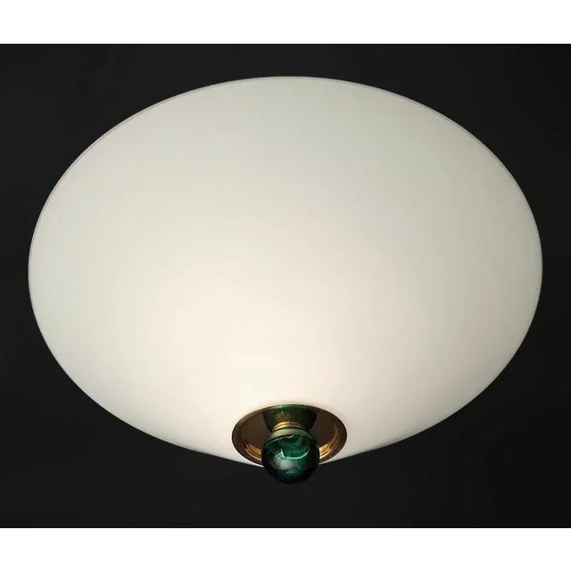 Vintage Italian flush mount with an elegant satin opaline milky white glass shade and a green ball in the center / Made in...