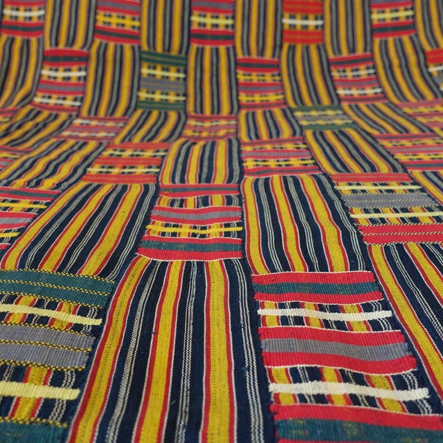Hand-woven "Kente" fabrics have a long tradition in the Asante population and are mainly worn at ceremonial events.