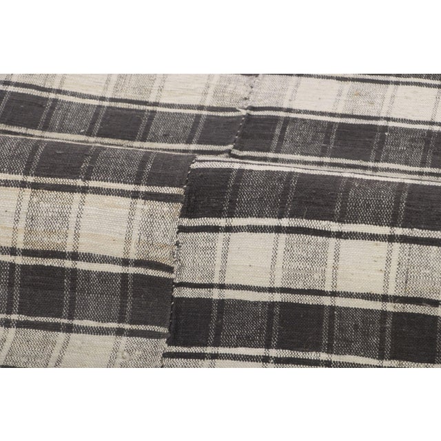 Handwoven in wool and originating circa 1950-1959, this 6x9 vintage Turkish kilim joins Rug & Kilim’s Kilim & Flat Weave...