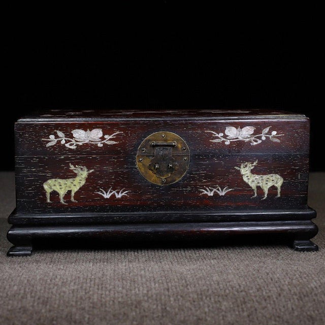 This beautifully crafted rectangular box features a rich, dark reddish-brown wood grain (described as Small-Leaf Red...
