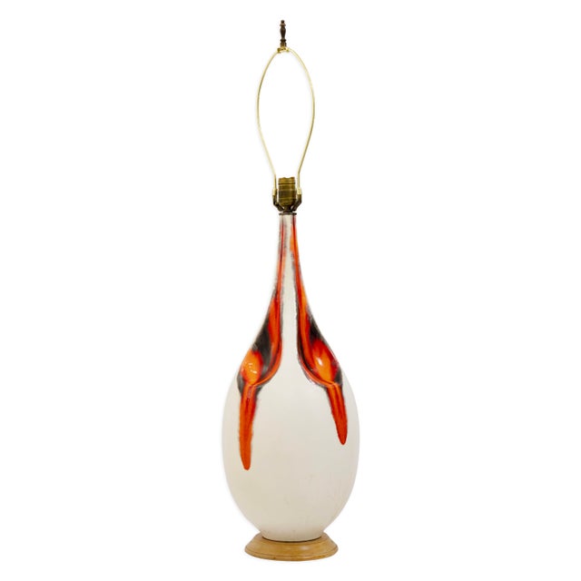 This ceramic table lamp brings Mid Century character with their sculptural silhouettes and drip-glaze detailing. The lamp...