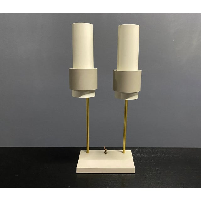 Rarel double cone desk or table lamp by Gerald Thurston for Lightolier. This one doesn't come up for sale too often and is...
