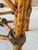 Absolutely stunning vintage octagonal dining table featuring a richly detailed tortoise bamboo base with dramatic wrapped...