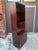Rosewood Standing Bar Cabinet. When door opens light turns on in the mirrored Bar area. 2 adjustable glass shelves in the...