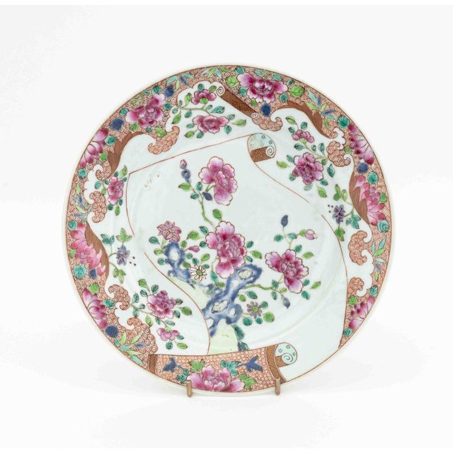 Group of Four Chinese Export Famille Rose Porcelain Plates, Qianlong Period, each hand-enameled with chrysanthemum flowers...