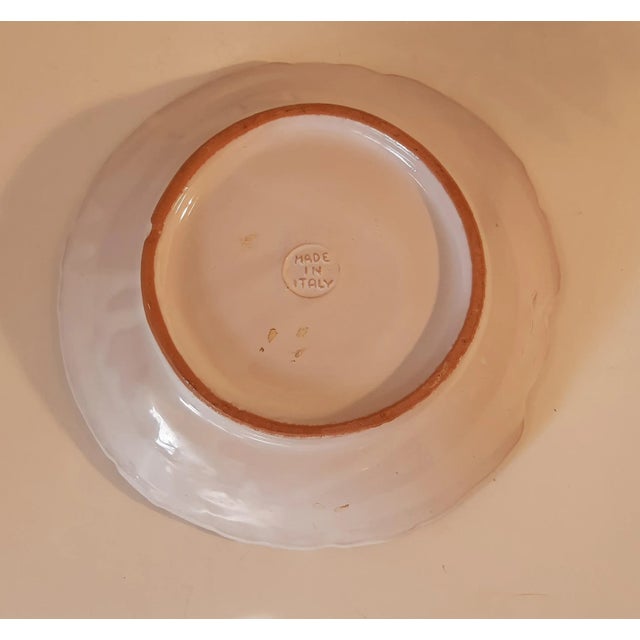 Gorgeously painted Majolica pottery lions head bowl. This piece is a solid heavy piece and hand painted with remarkably...