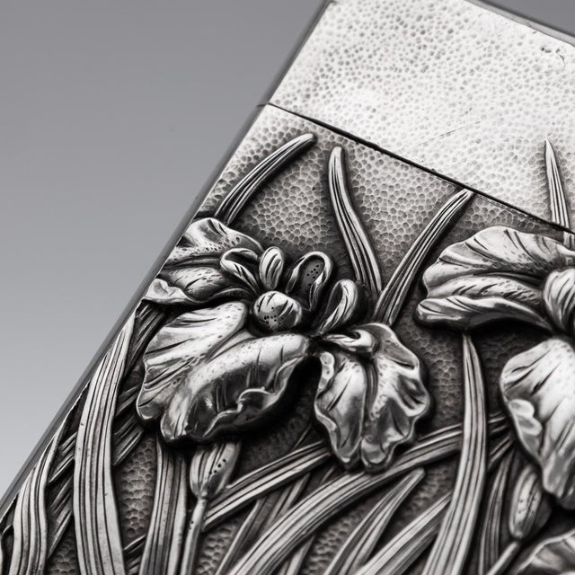 Antique 20th Century Japanese solid silver card case, featuring high relief Iris flowerson a textured background. The...