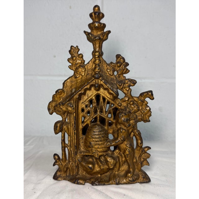 The antique 19th century Victorian cast iron bear and beehive still bank is a rare and collectible piece that showcases...