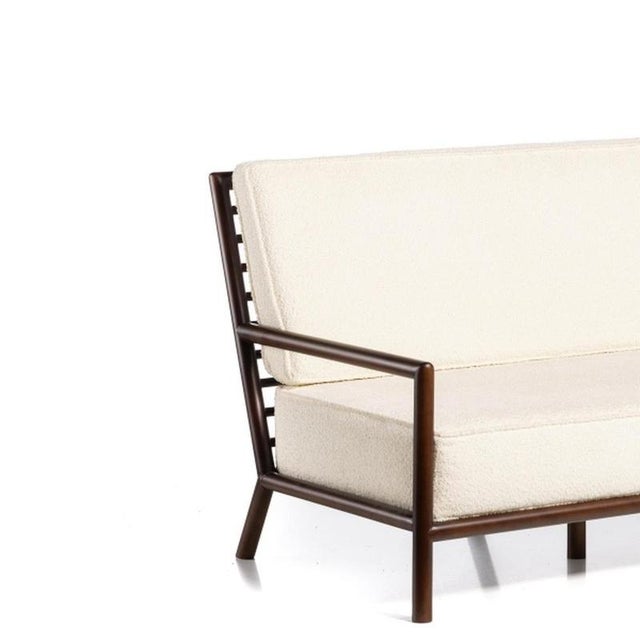 Furniture - Robsjohn-Gibbings Sofa. Sofa manufactured in the 1950s by T.H. Robsjohn-Gibbings. The sofa's support structure...
