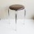 This round stool with chrome frame and brown synthetic leather cover dates from the late 1970s. The simple design language...