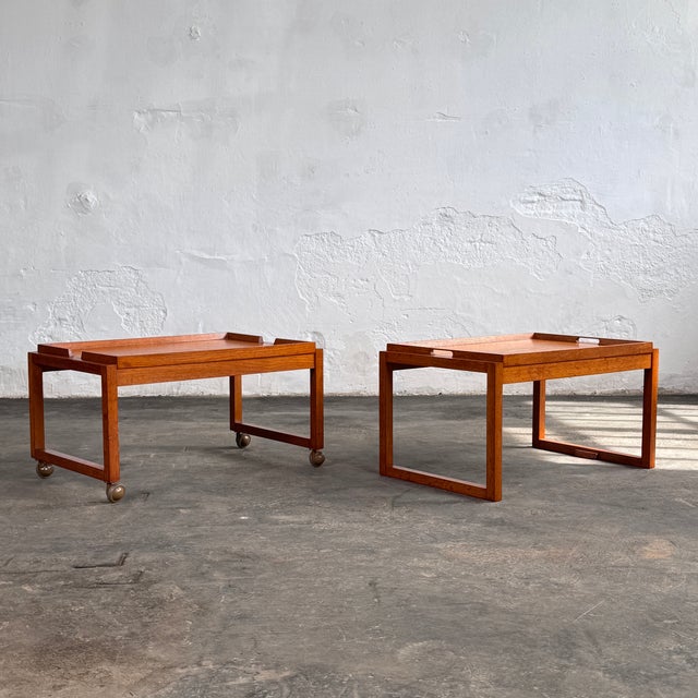This two-tier trolley is a versatile piece of british mid-century design, manufactured by white and newton during the...