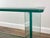 Beautiful glass console attributed to Leon Rosen for the Pace Collection. It has a subtle green tint with a beveled glass...
