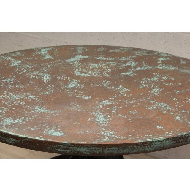 Embrace the raw elegance of the Vintage Industrial Copper Table, a statement piece that masterfully combines form and...