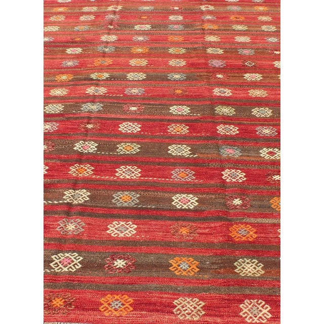 Textile Colorful Red and Brown Striped Turkish Kilim Rug With Geometric Shapes For Sale - Image 7 of 13