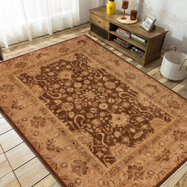 "Enhance the ambiance of your home with this magnificent Persian-influenced Turkish hand-knotted rug made by skilled...