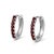 These elegant hoop earrings feature a row of rich Garnet gemstones, admired for their deep red hue and captivating...
