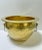 A striking vintage hammered brass cachepot featuring sculptural foo dog ring handles. The Asian motif paired with warm...
