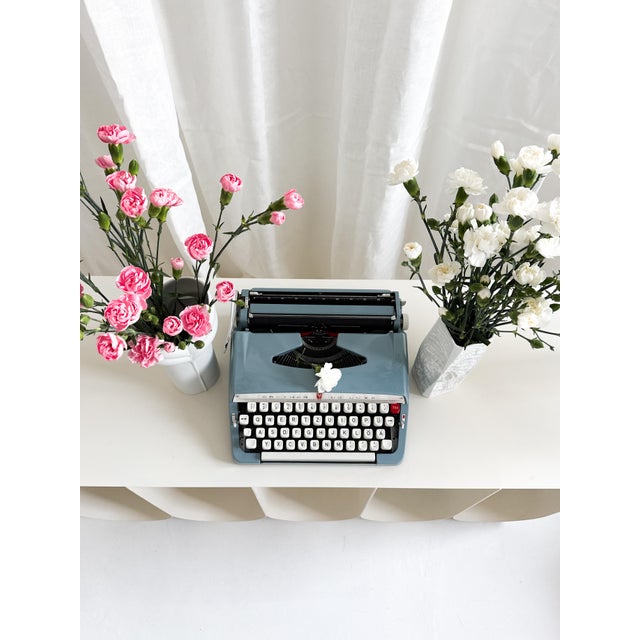 This original brother de luxe typewriter is a striking example of japanese mid-century industrial design, produced in the...