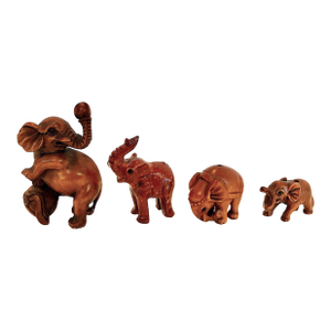 A Collection of Miniature, Hand-Carved Elephant Netsukes