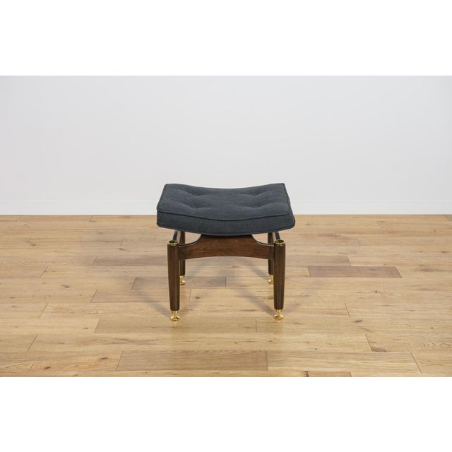 A stool from the Librenza series produced by the British G-Plan factory in the 1950s. A stool with a wooden base made of...