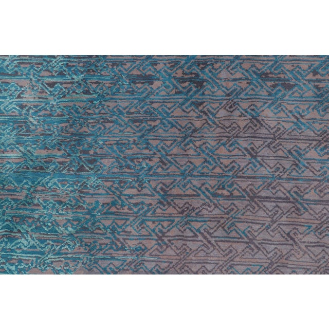 Hand-knotted in premium wool, this 8x10 rug is an exciting addition to the archive of Rug & Kilim. It features a...