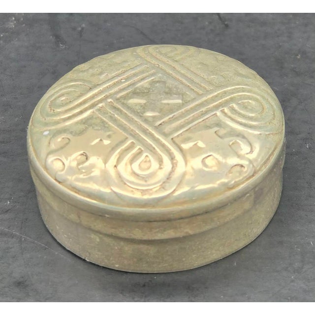 Offered is a small round-shaped .925 silver pill box with an intricate Celtic-inspired etched pattern on the lid made in...