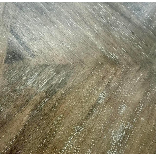 Bridging the gap between organic modernism and Hollywood Regency flair, the "Davenport" dining table by Gabby is a study...