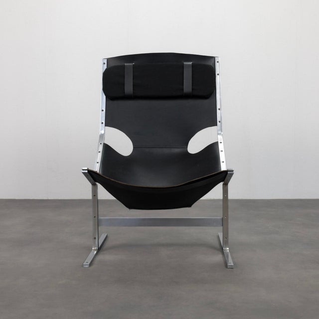 An exceptionally rare lounge chair designed by pierre thielen for the prestigious dutch department store and furniture...