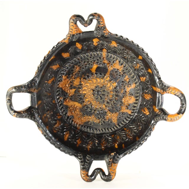 An outstanding earthenware pottery dish A stunning example of the Mexican Folk Art pottery crafted in the renown ceramics...