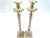 Super decorative pair of neoclassical style silver plated candle holders. Colums, are tall with reeded shaft, heavily...