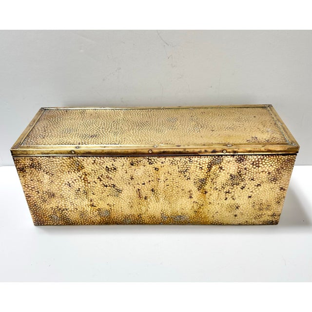 A wonderful heavy-weight textured brass box. It may be a handmade humidor. The brass is a hammered repoussé. It’s a...