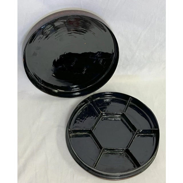 Classic vintage Chinese lacquered wooden box from the mid 20th century. It is painted with various zodiac symbols in...