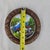 Vintage Hand Painted Folk Art Wood Plaque Village Scene Carved Round Frame For Sale - Image 9 of 9