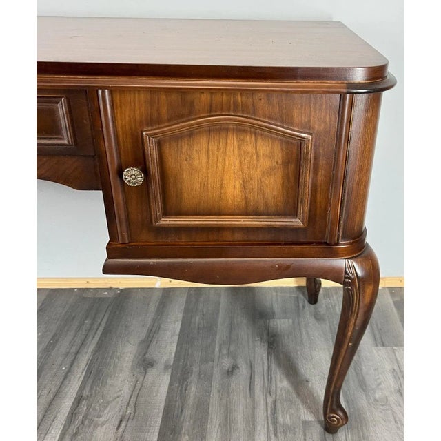 A refined Vintage French Louis sideboard console , this piece embodies graceful lines and elegant craftsmanship. The...