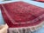 This hand-knotted Bokhara rug carries the classic Tekke gul design — rows of octagonal "elephant's foot" medallions in...