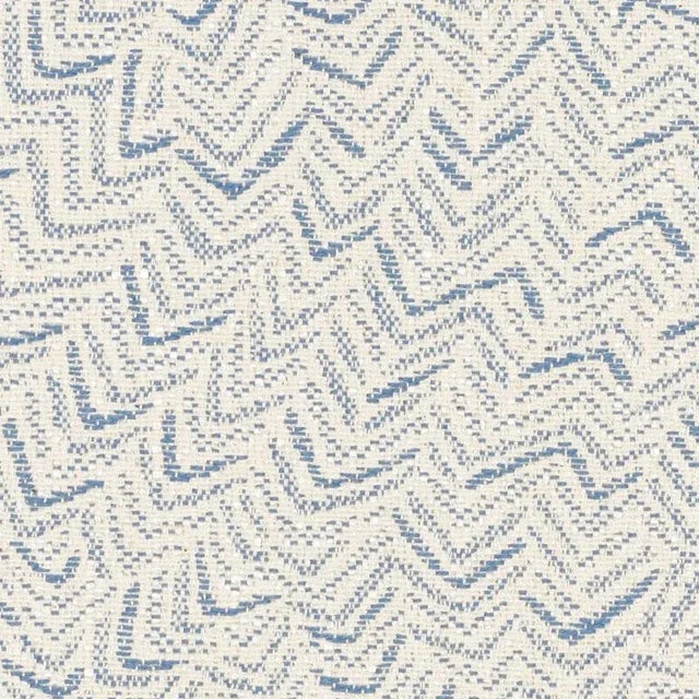 This small-scale, abstract jacquard weave features a multi-directional pattern that reads like a neutral, making it a...