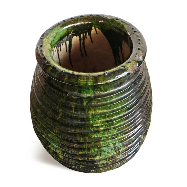 Striking vintage green Moroccan ceramic pottery with ribbed texture. Opening at top is 11" diameter. Includes drainage...