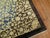 an early 20th Century Chinese rug with a floral design in cream, blue, yellow and brown Measures: 8'11'' x 11'5''.