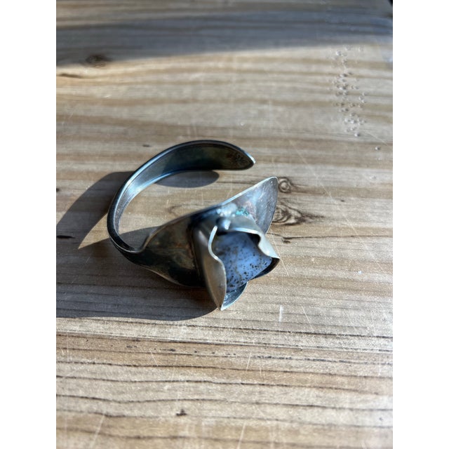 Up for consideration is a beautiful vintage small Roger and Sonaa silver wrist cuff with a stone. This would look lovely...
