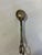 Elegant vintage silverplate serving tongs made in Italy featuring a distinctive scissor-style mechanism and decorative...