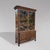 Charming two-part oak sideboard with two glazed doors and a window in the upper section. Shaped shelves. Made in northern...