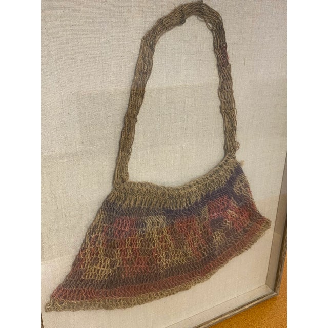 Very pretty, contemporary, Bilum Bag from the Sepik River in Papua New Guinea. Natural fibers, hand-woven by women in the...