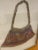Very pretty, contemporary, Bilum Bag from the Sepik River in Papua New Guinea. Natural fibers, hand-woven by women in the...