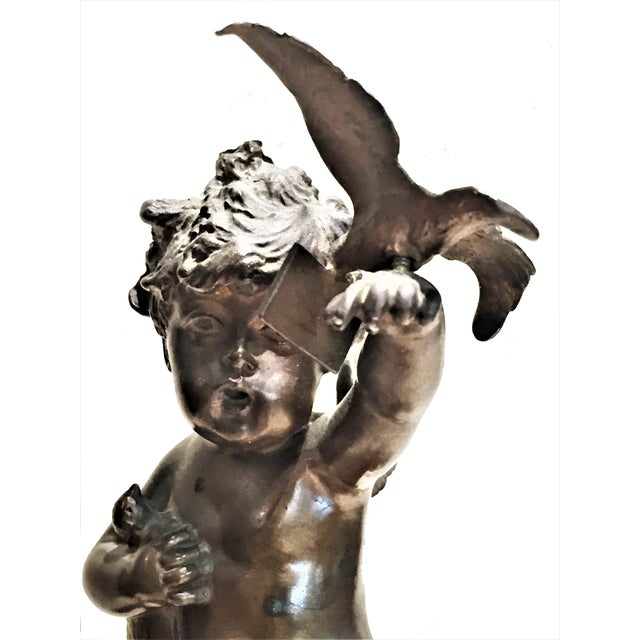 Signed illegibly original red marble base. Dimensions: H: 8.25” x W: 3.25” x D: 4.25” Base diameter: 2.75” This beautiful...