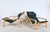 A stunning pair of newly upholstered birch wood pulkka lounge chairs by ilmari lappalainen for asko, finland 1960s. The...